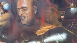 Curator as Judas, inspired by Caravaggio, by local artist Adnate. 